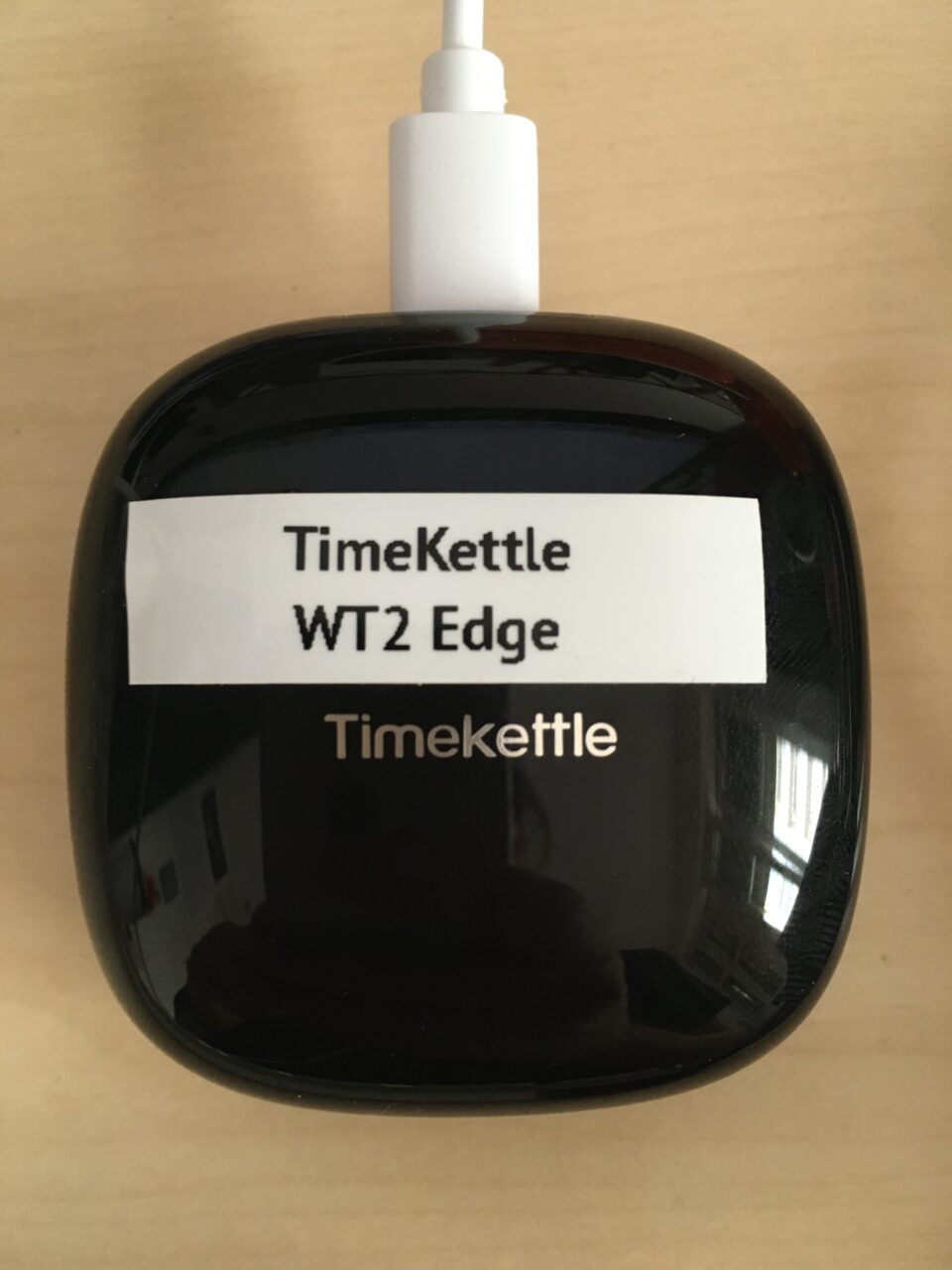 Oreillettes de traduction TimeKettle WT2 Edge, boîtier de chargement fermé